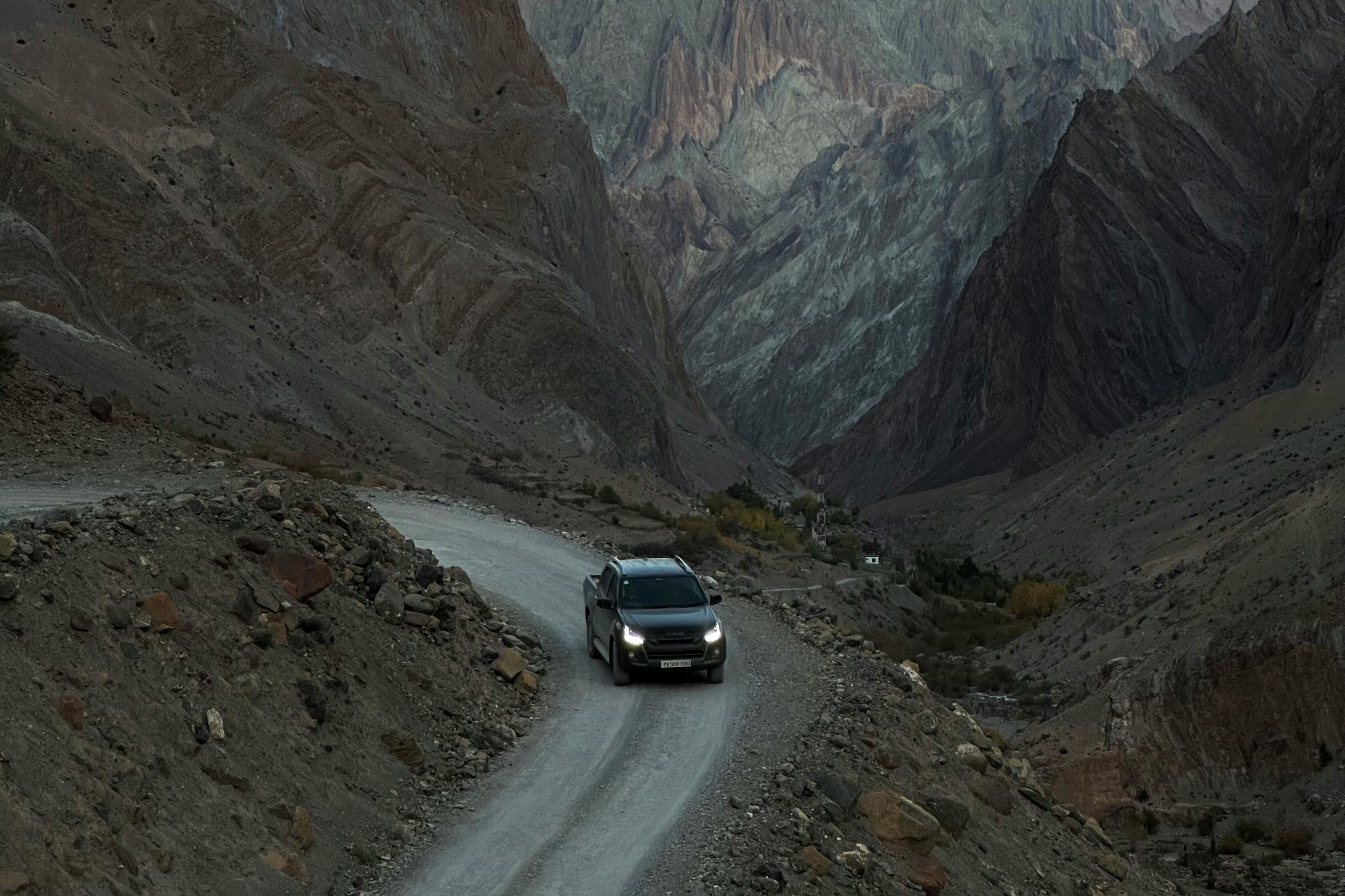 4X4 pickup truck on mountain road near baralacha la pass