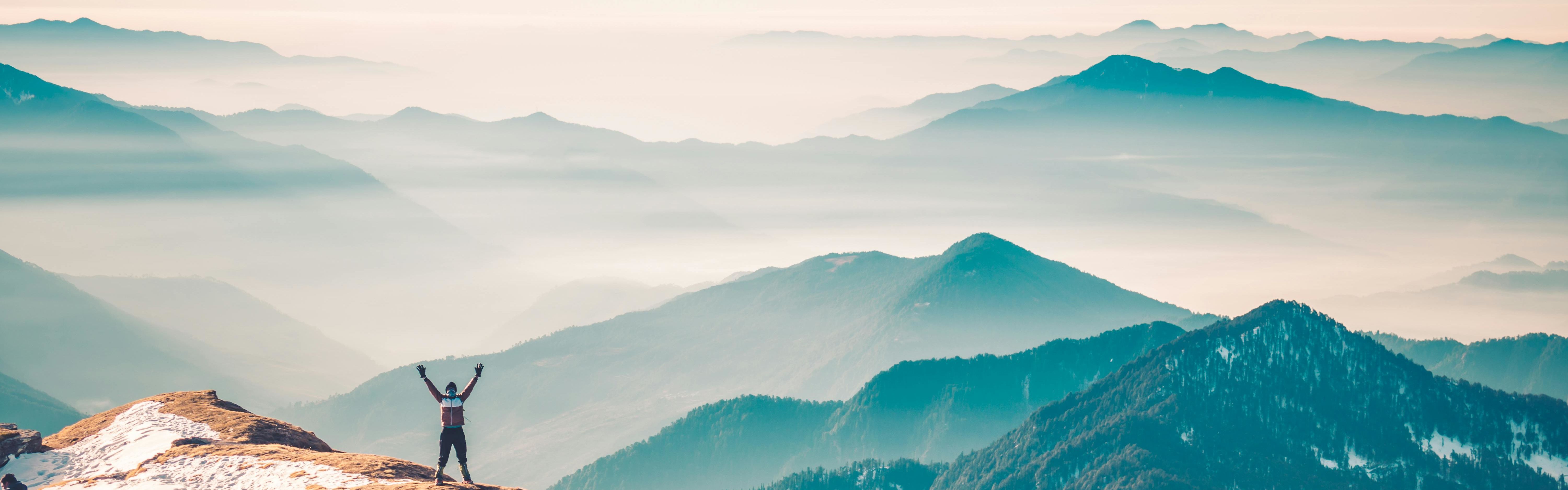 a man standing in the himalayas