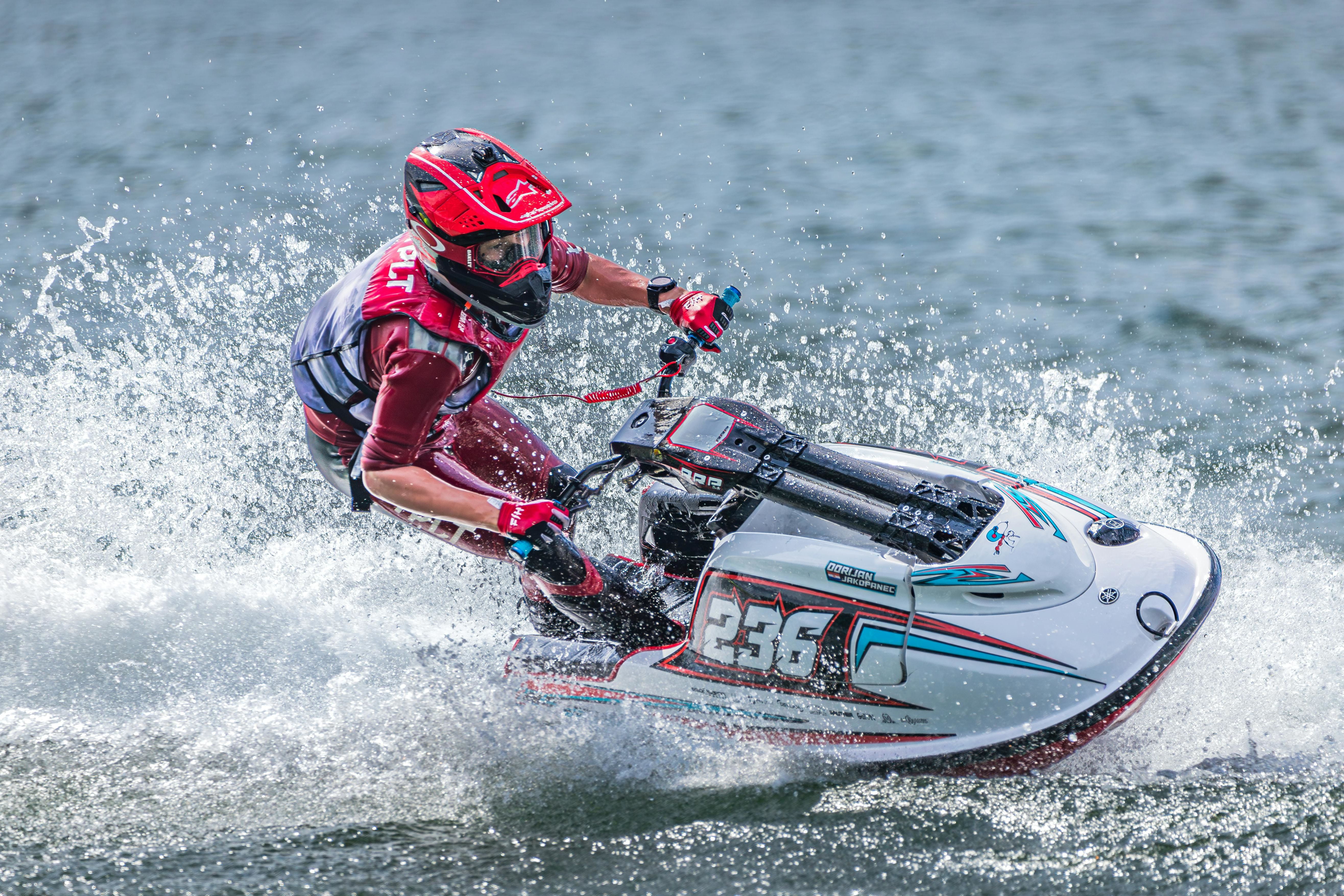 a person riding a jet ski in the water