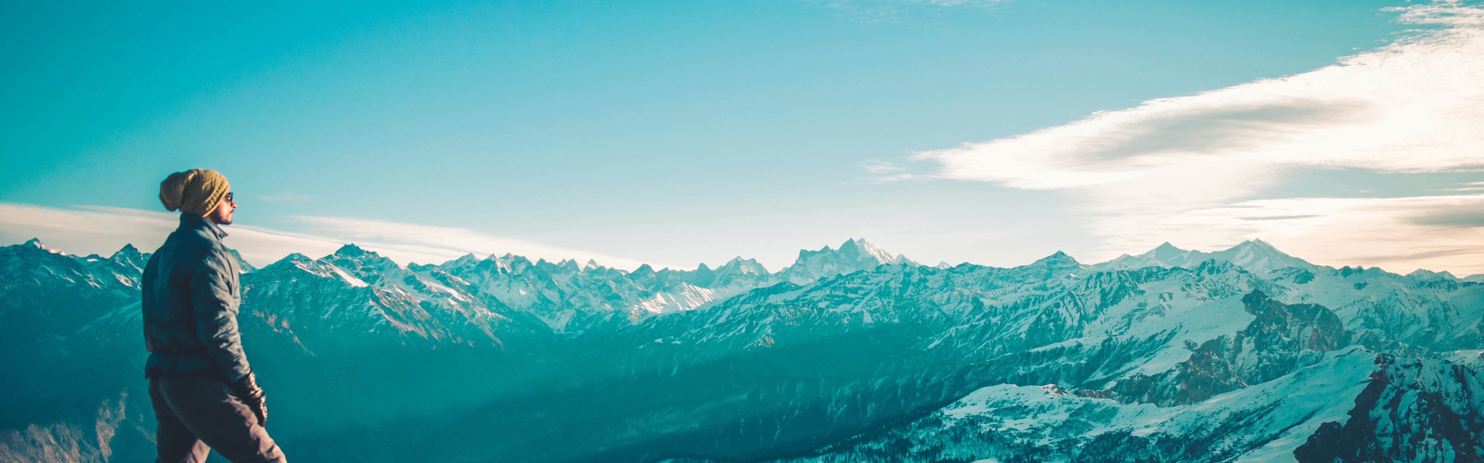 a person standing on top of a mountain