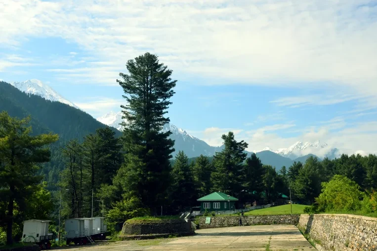 view of nearby green mountains from pahalgam golf course