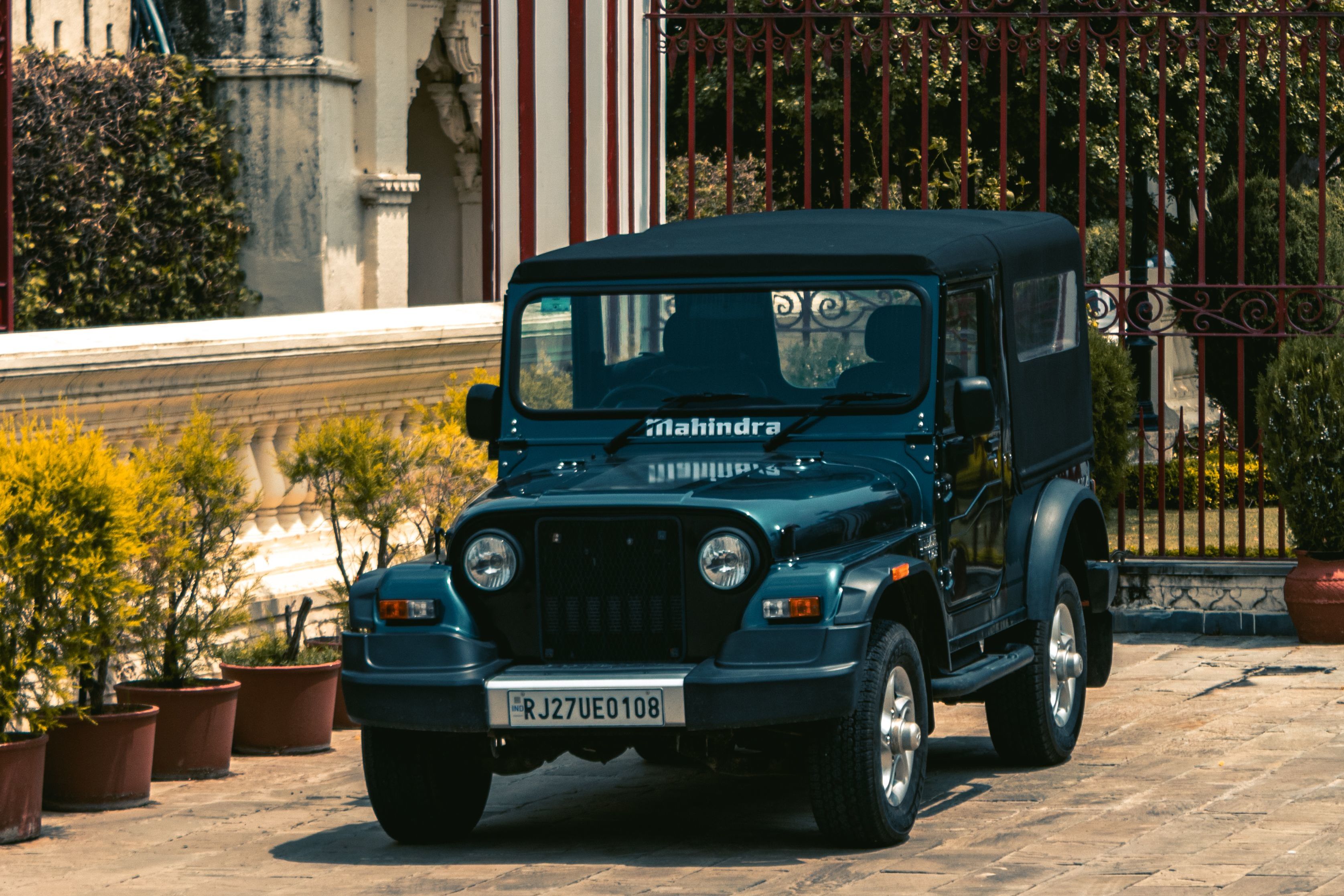 black jeep parked in car museum at udaipur