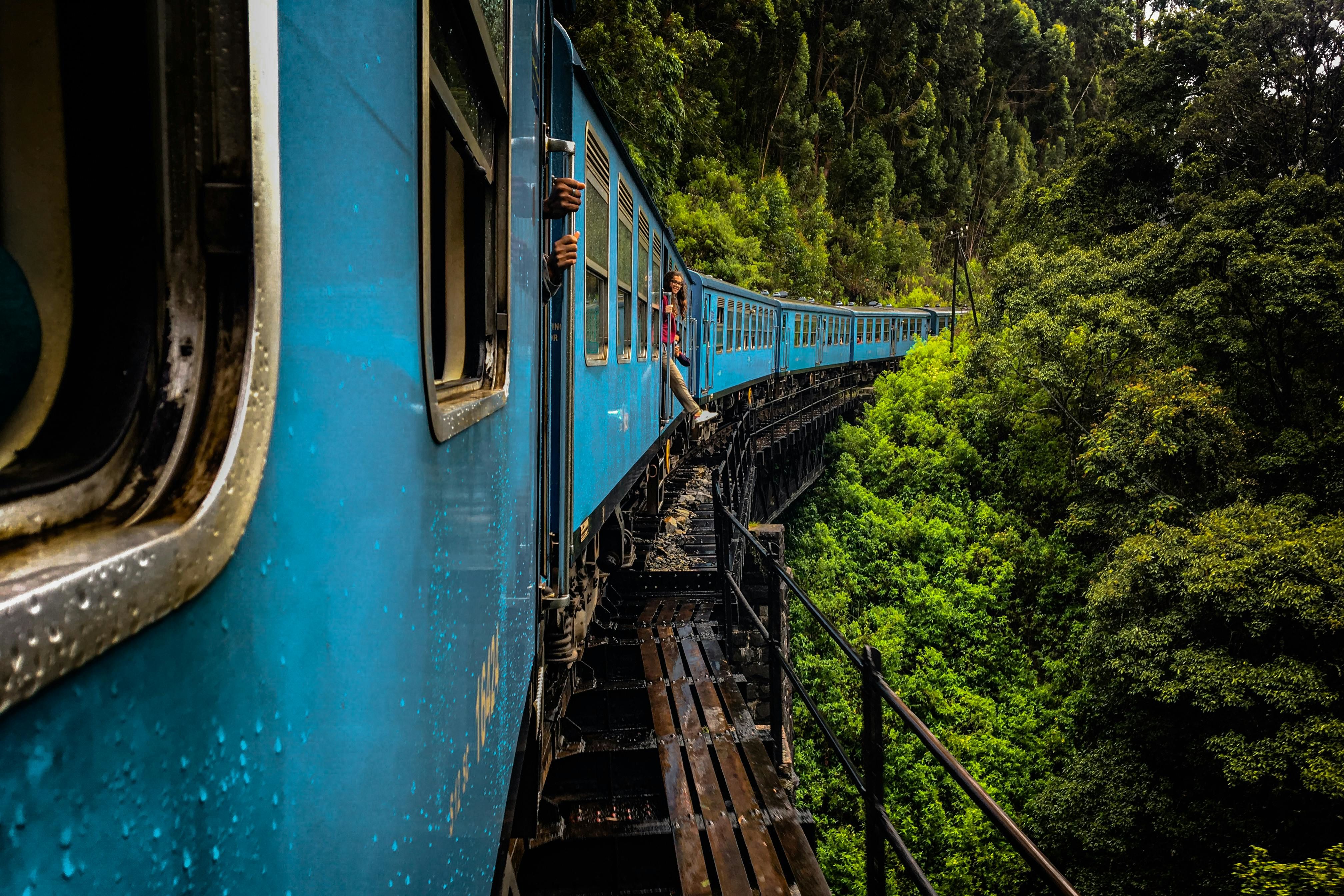 blue train on rails