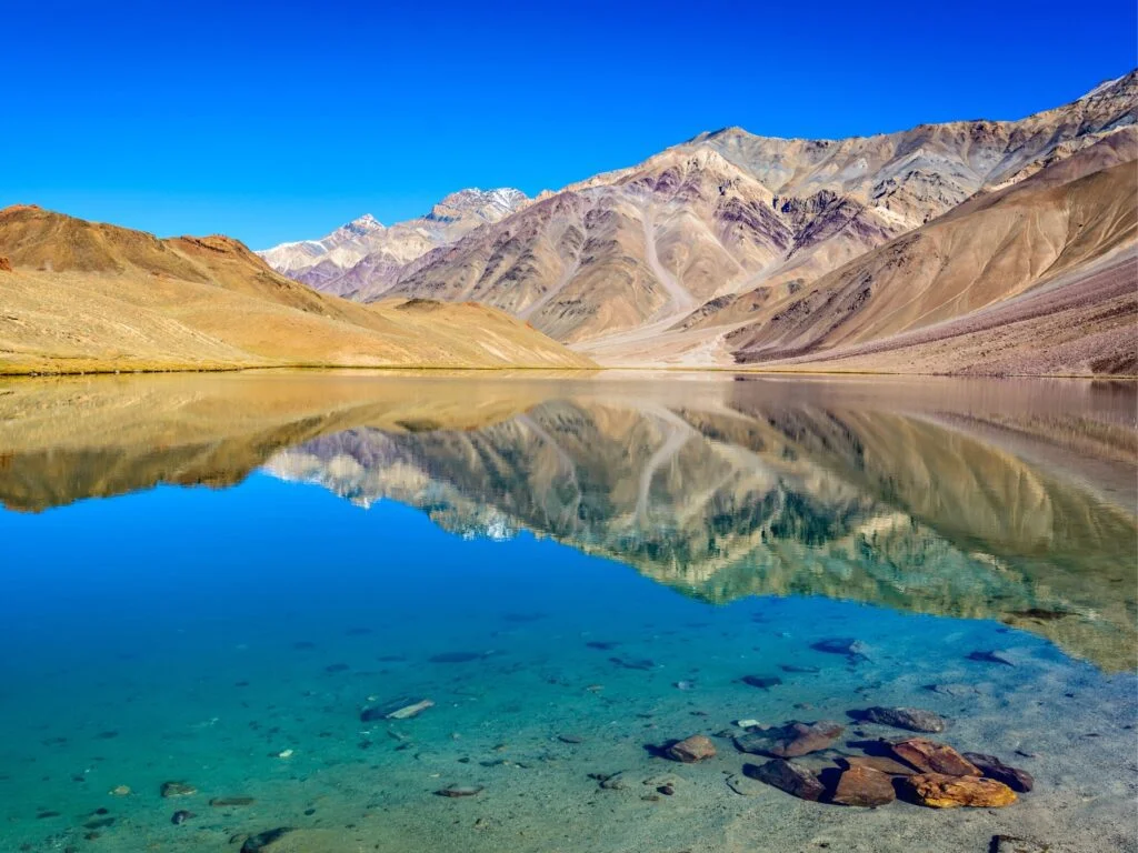 a view of chandra taal lake during daytime