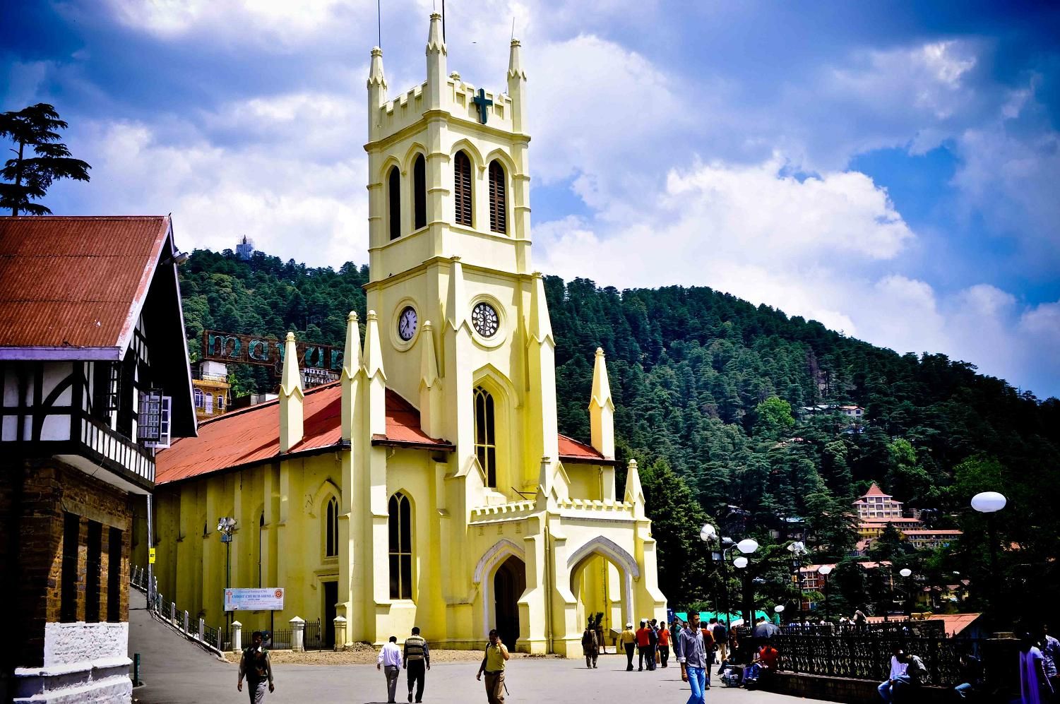 people walking near christ church in shimla