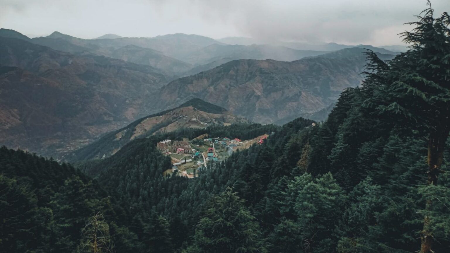 mountain range covered with green trees in fagu