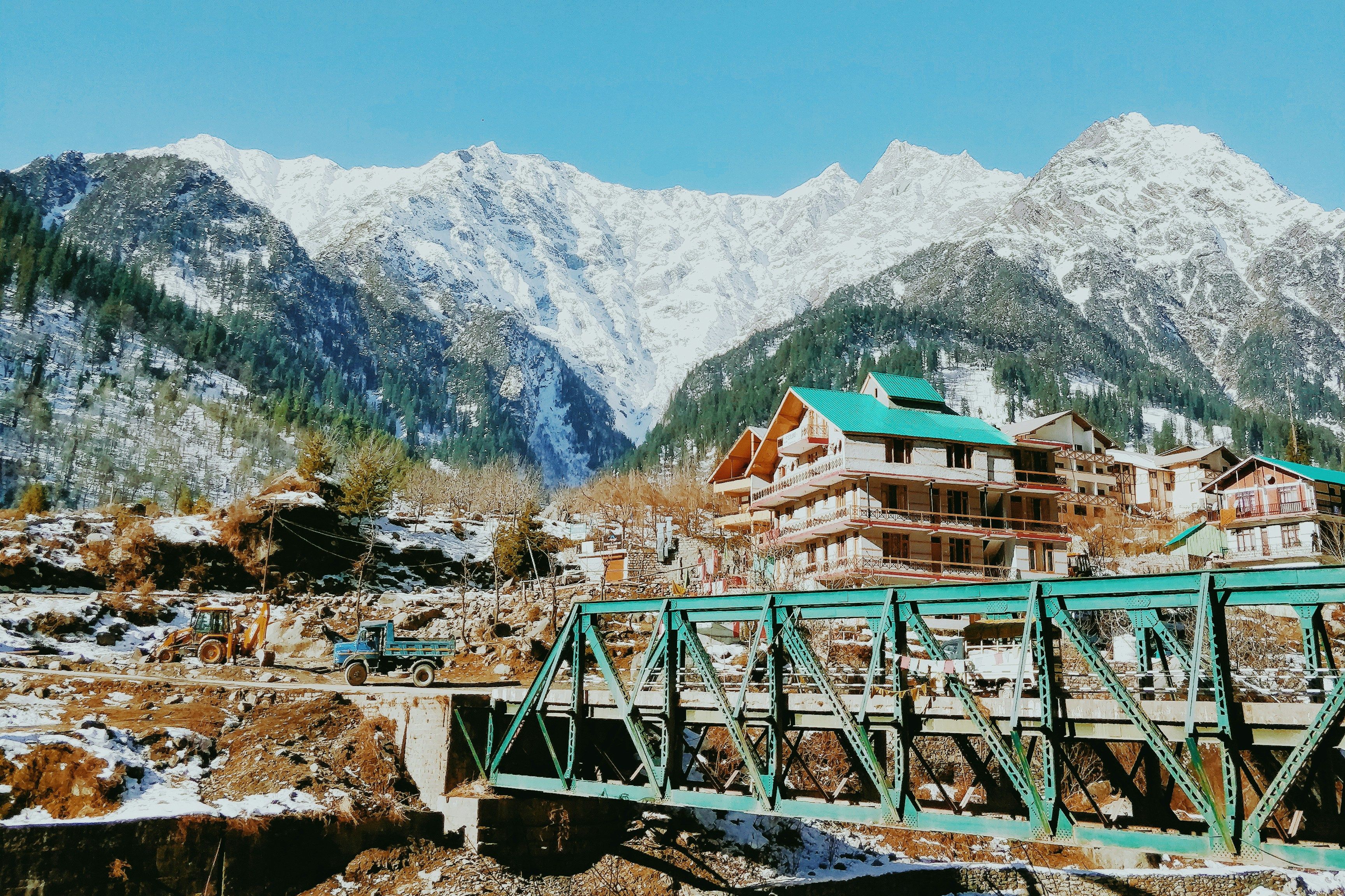 green bridge over the mountains in manali