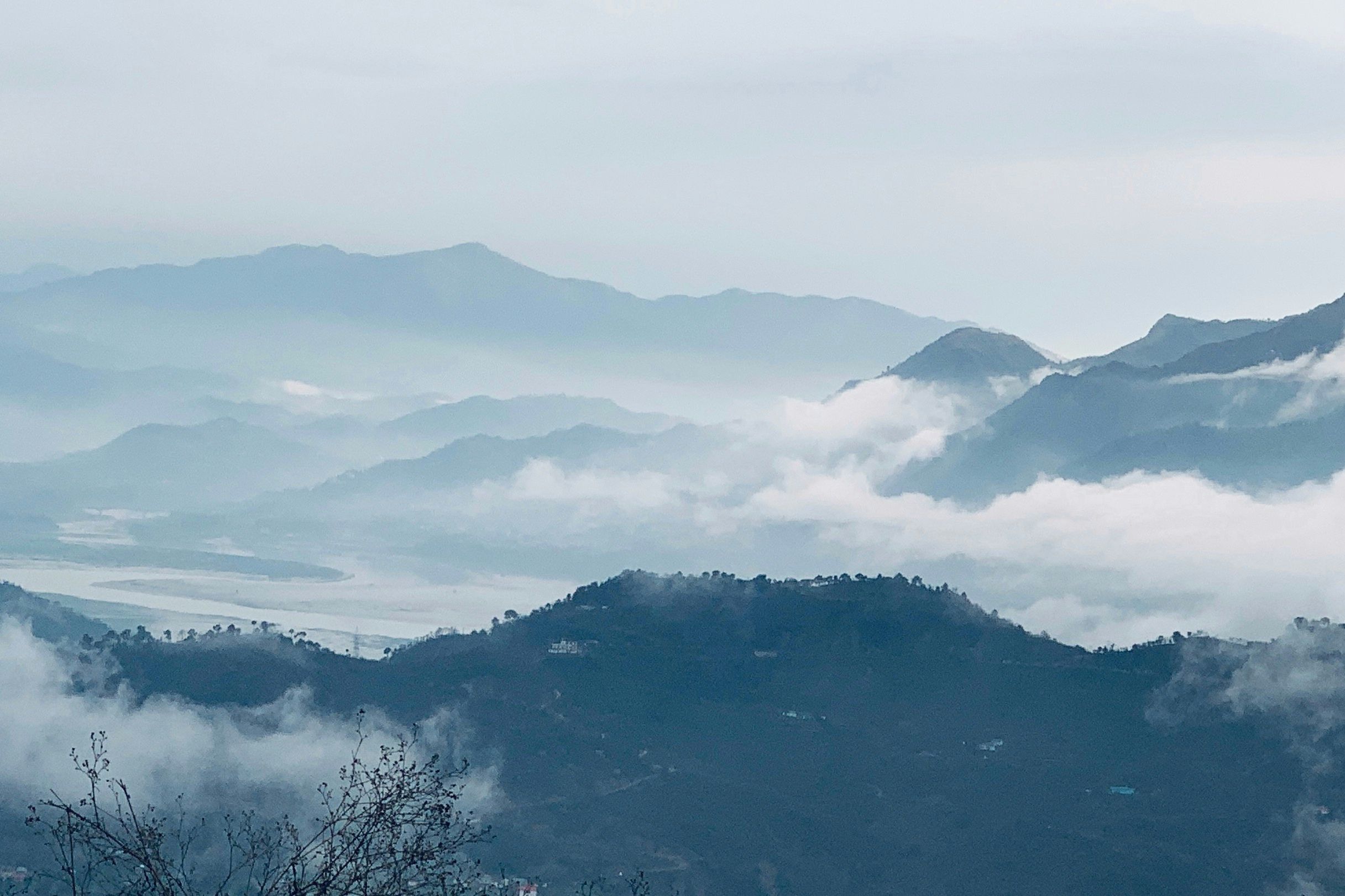 green mountains under white clouds during daytime in bilaspur himachal pradesh