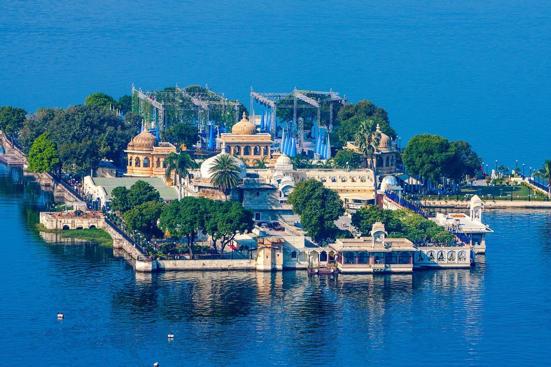 view of jag mandir palace surrounded by a lake in udaipur