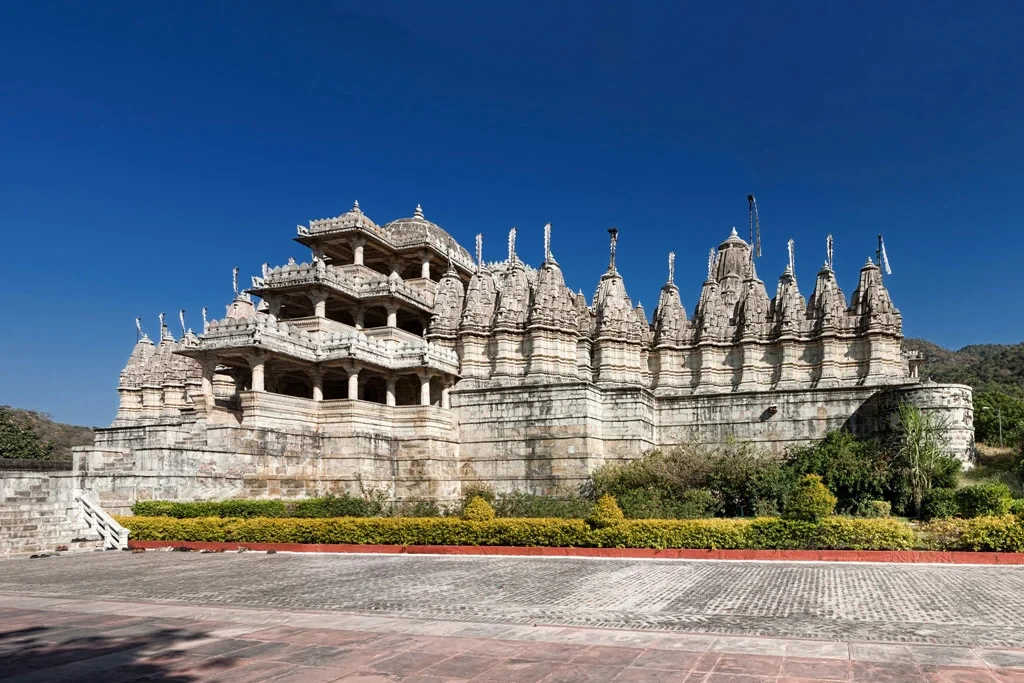 view of the intricate carvings on the ranakpur jain temple in rajasthan