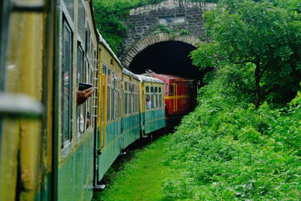 kalka shimla toy train going inside a tunnel