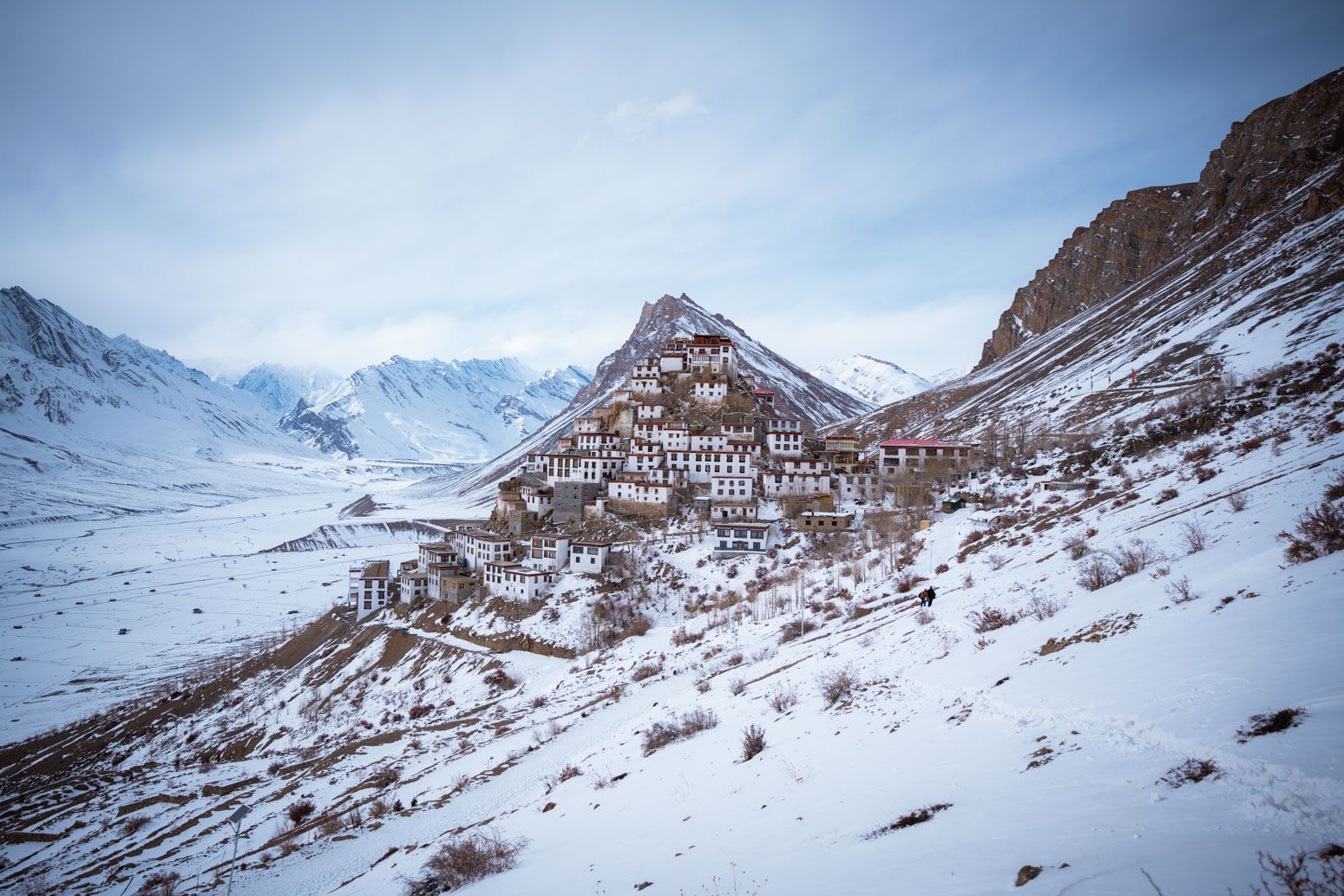 key monastery in spiti valley with snow around it during winter season