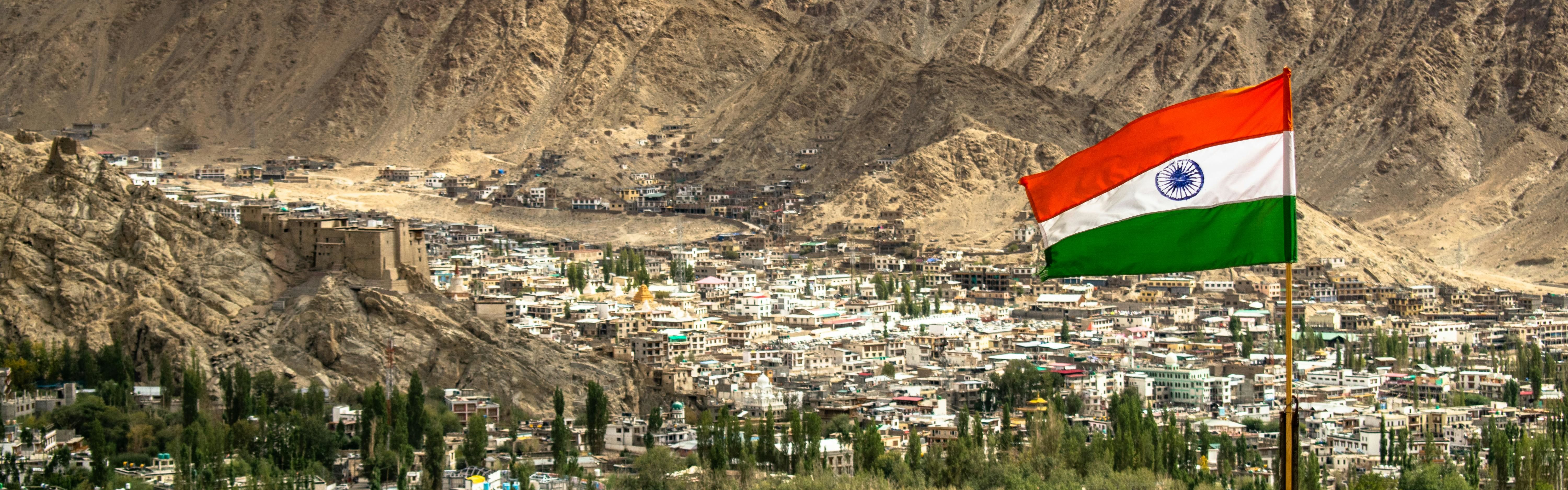 aerial view of leh city in India with an Indian flag