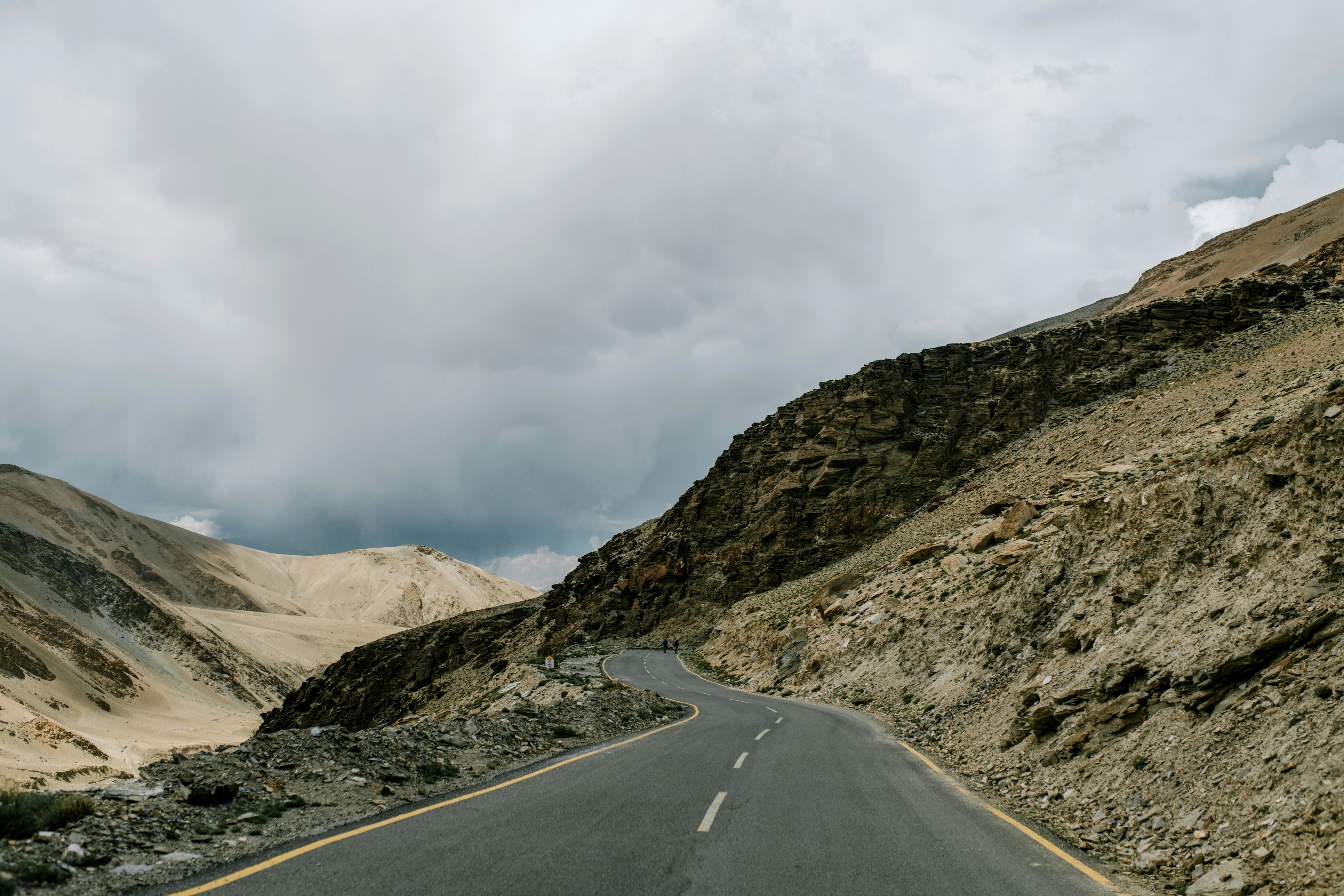 leh manali highway going through mountainous terrain