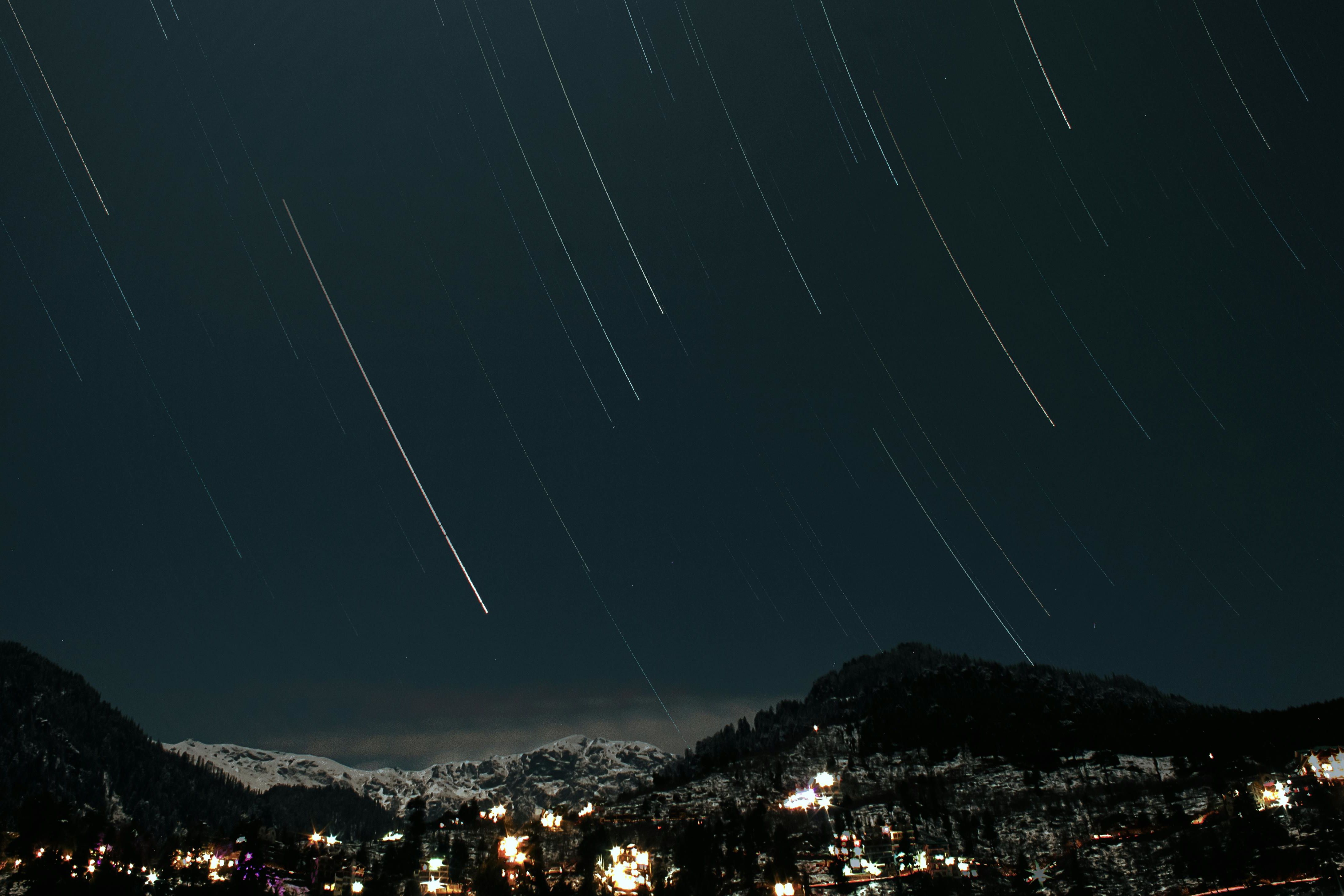 long exposure shot of stars in the sky at night in manali