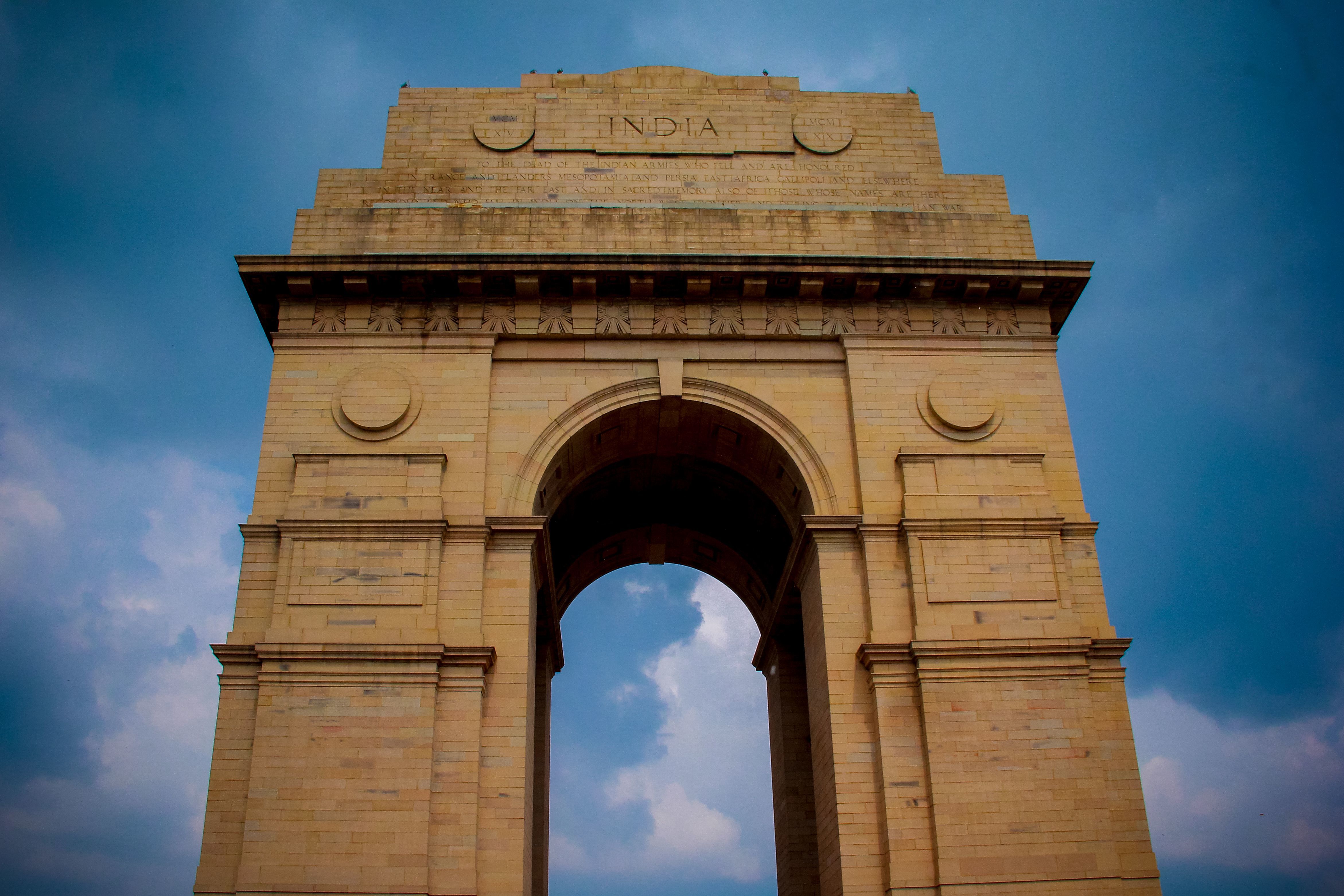 majestic view of india gate under a vibrant blue sky in new delhi