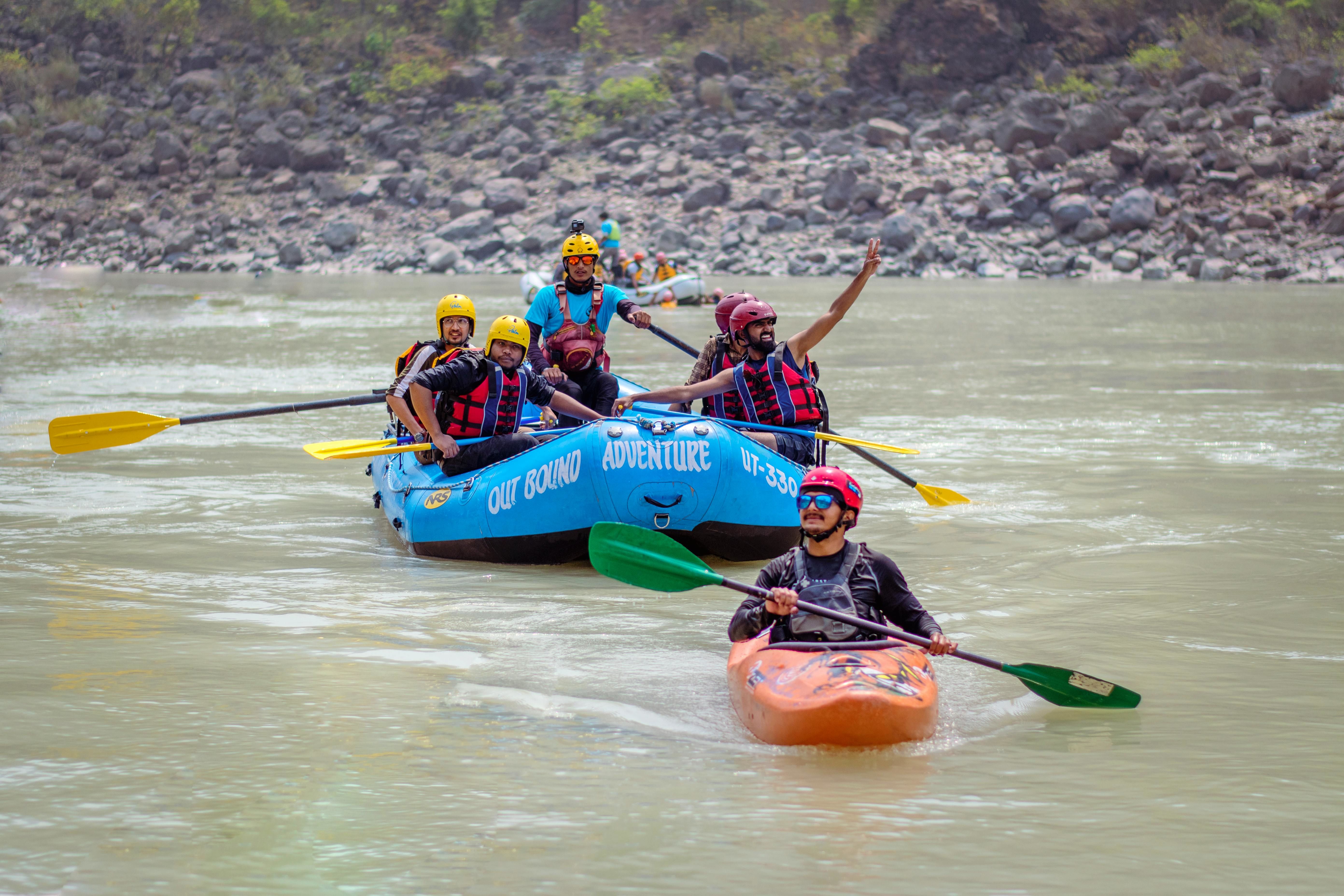 people enjoying rafting on the beas river in manali