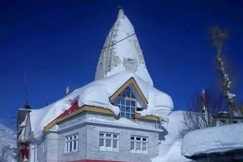 snow covered temple of raja ghepan at sissu