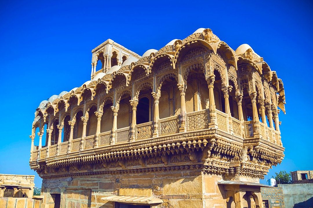 view of the salim singh ki haveli at jaisalmer with clear blue sky in the backdrop