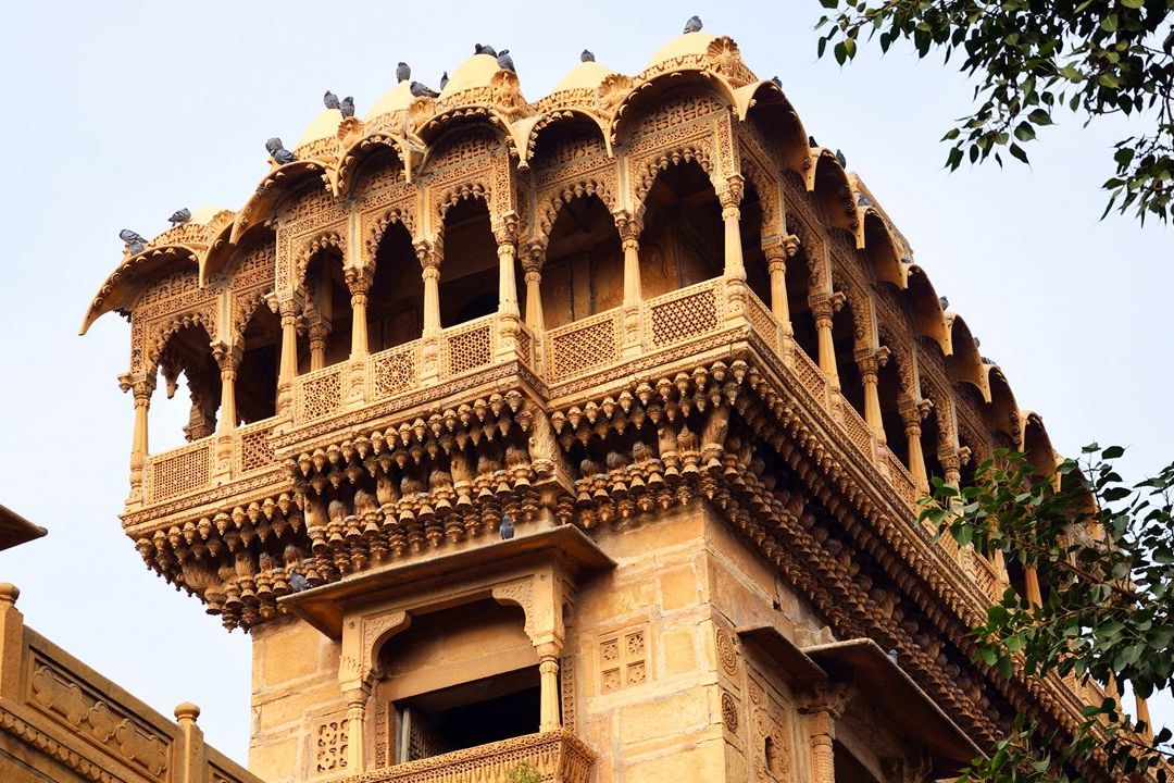 view of the salim singh ki haveli at jaisalmer with clear blue sky in the backdrop