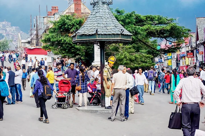 tourists walking near scandal point in shimla during daytime