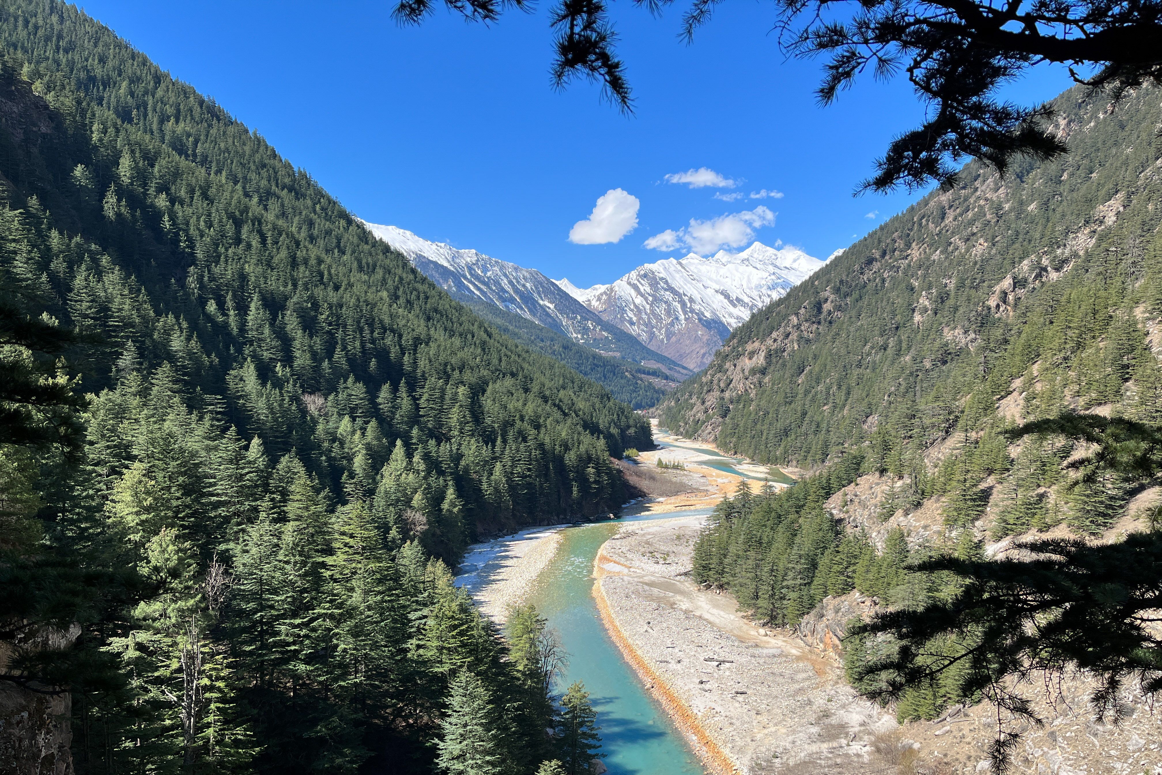 a scenic river valley in majestic mountain landscape near kinnaur valley