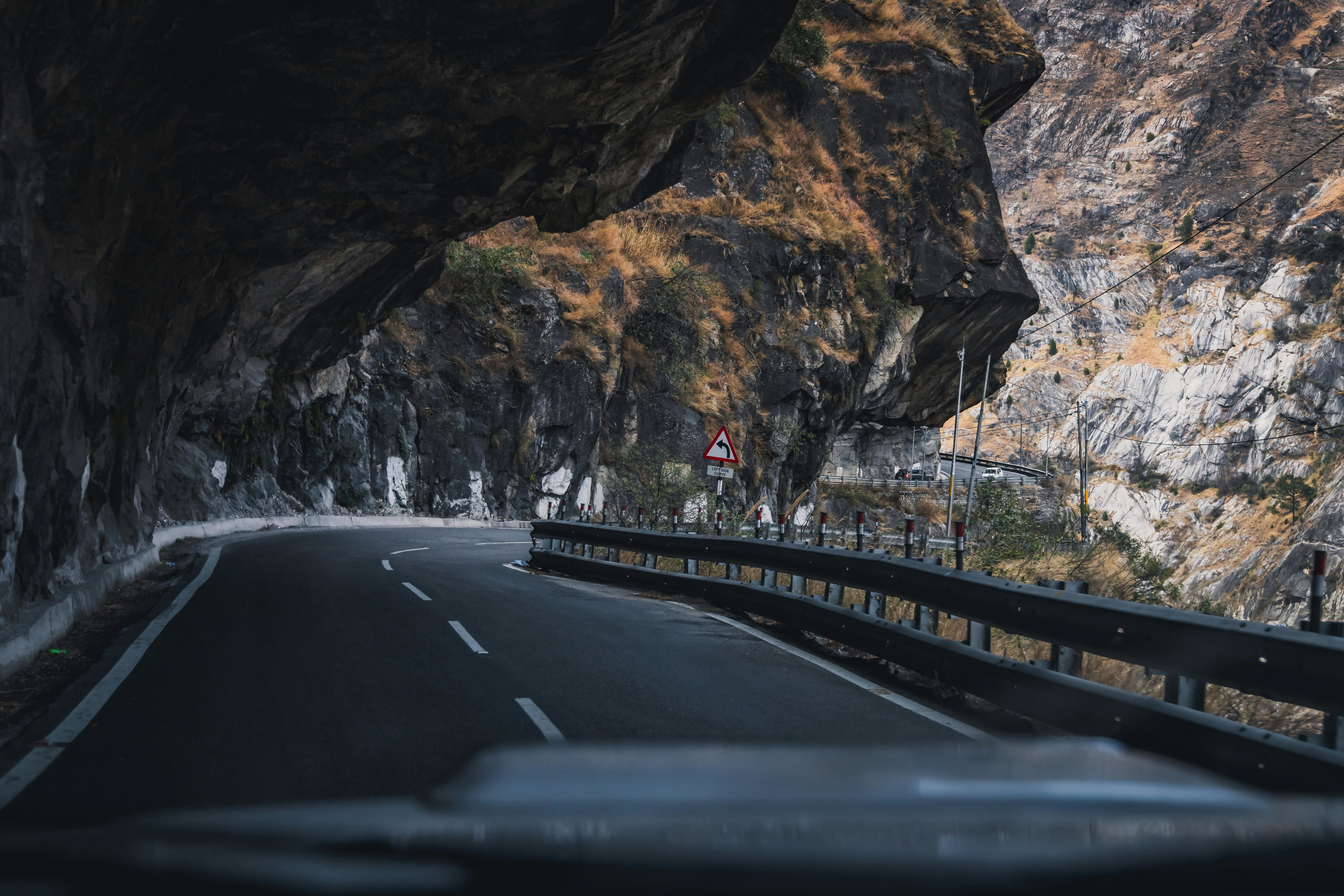 a scenic road in himalayan mountain pass
