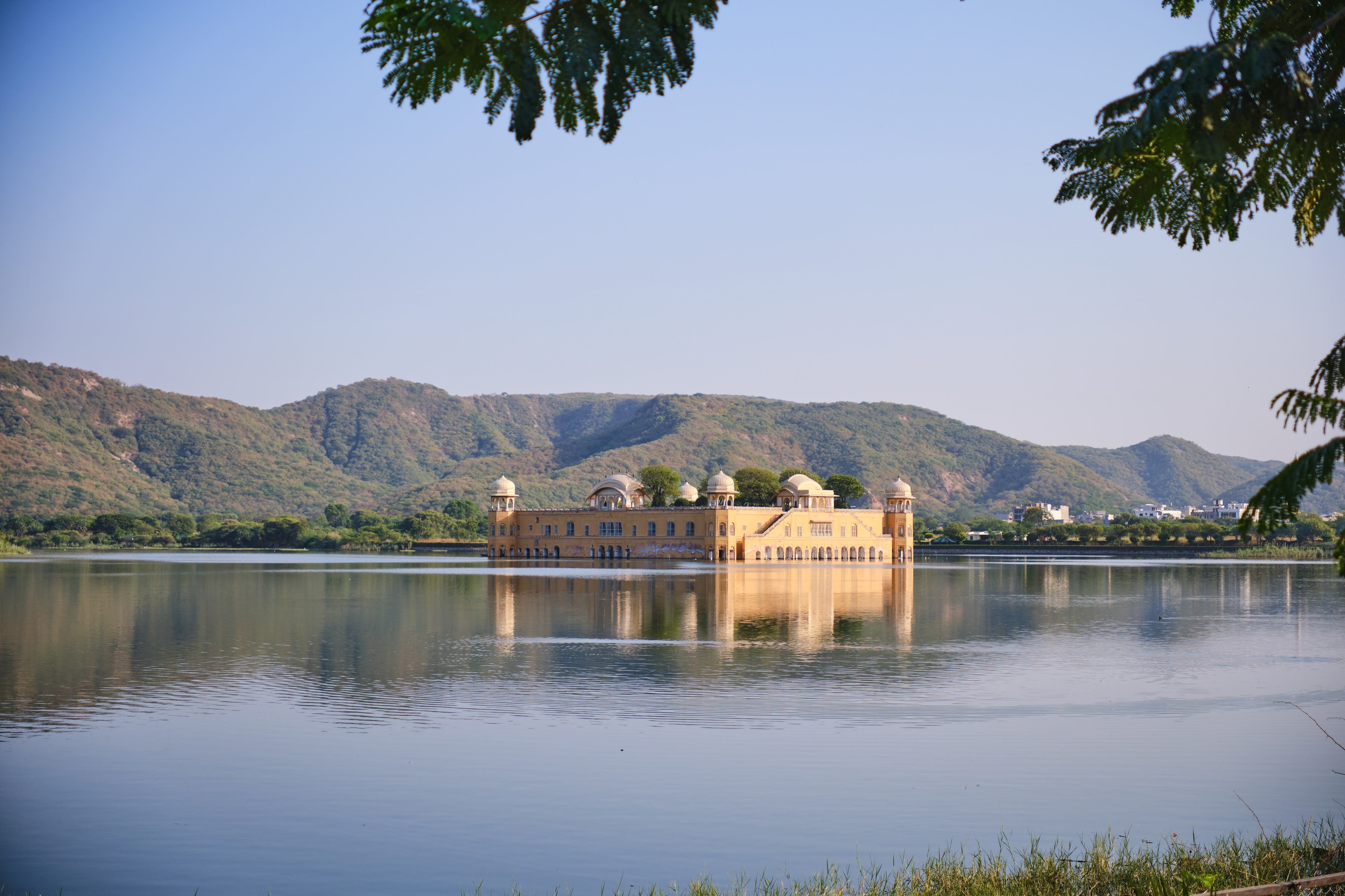 scenic view of jal mahal palace reflecting in man sagar lake in jaipur india