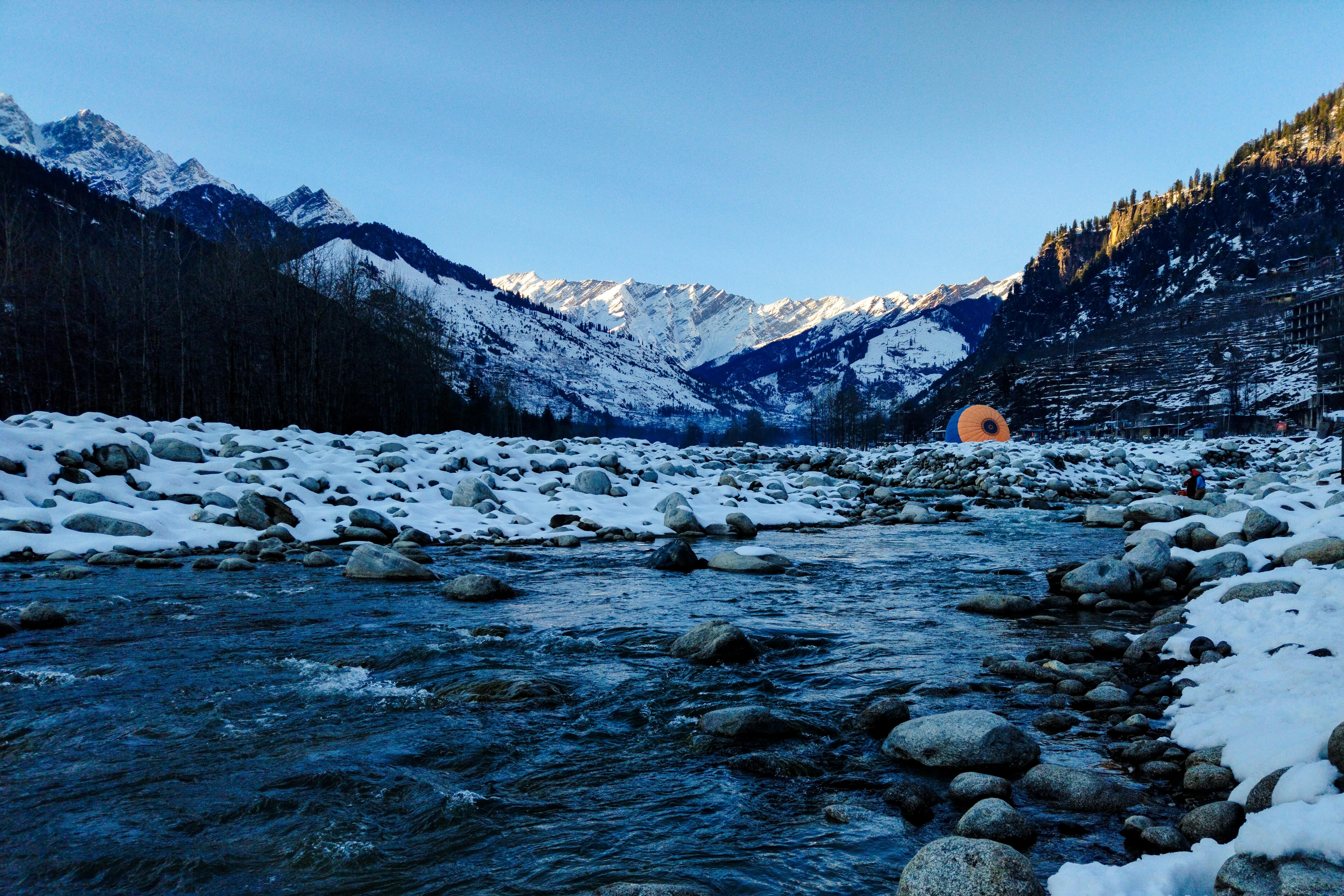 beas river flowing through scenic winter landscape in manali