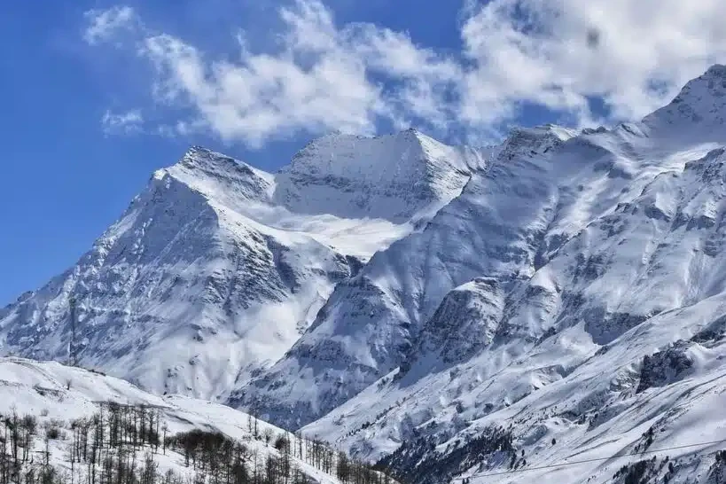 snow covered mountains in sissu valley during daytime