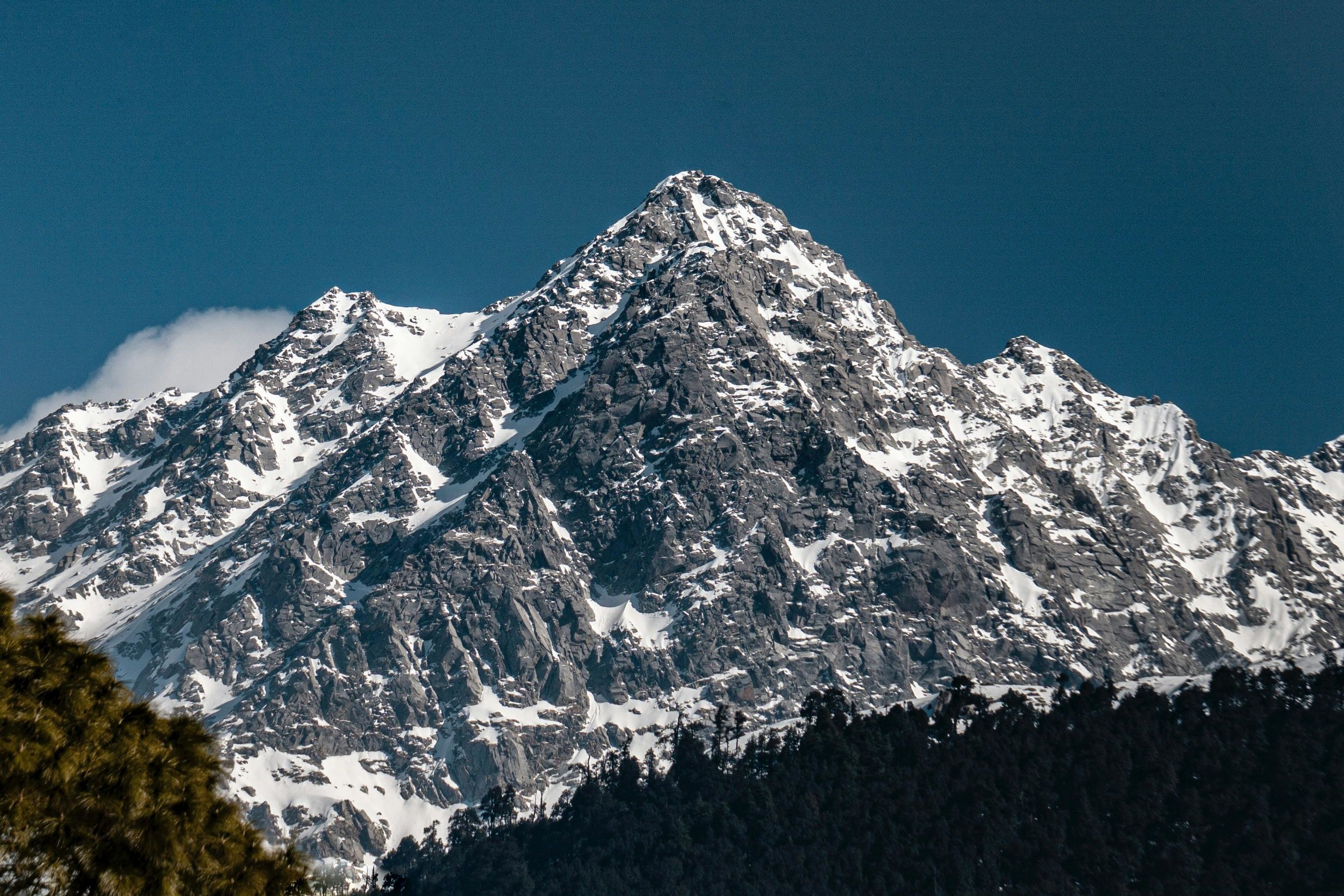 snowy rocky mountain in kangra