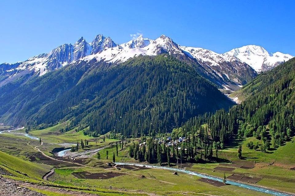 view of snow capped mountains near a valley in sonmarg kashmir