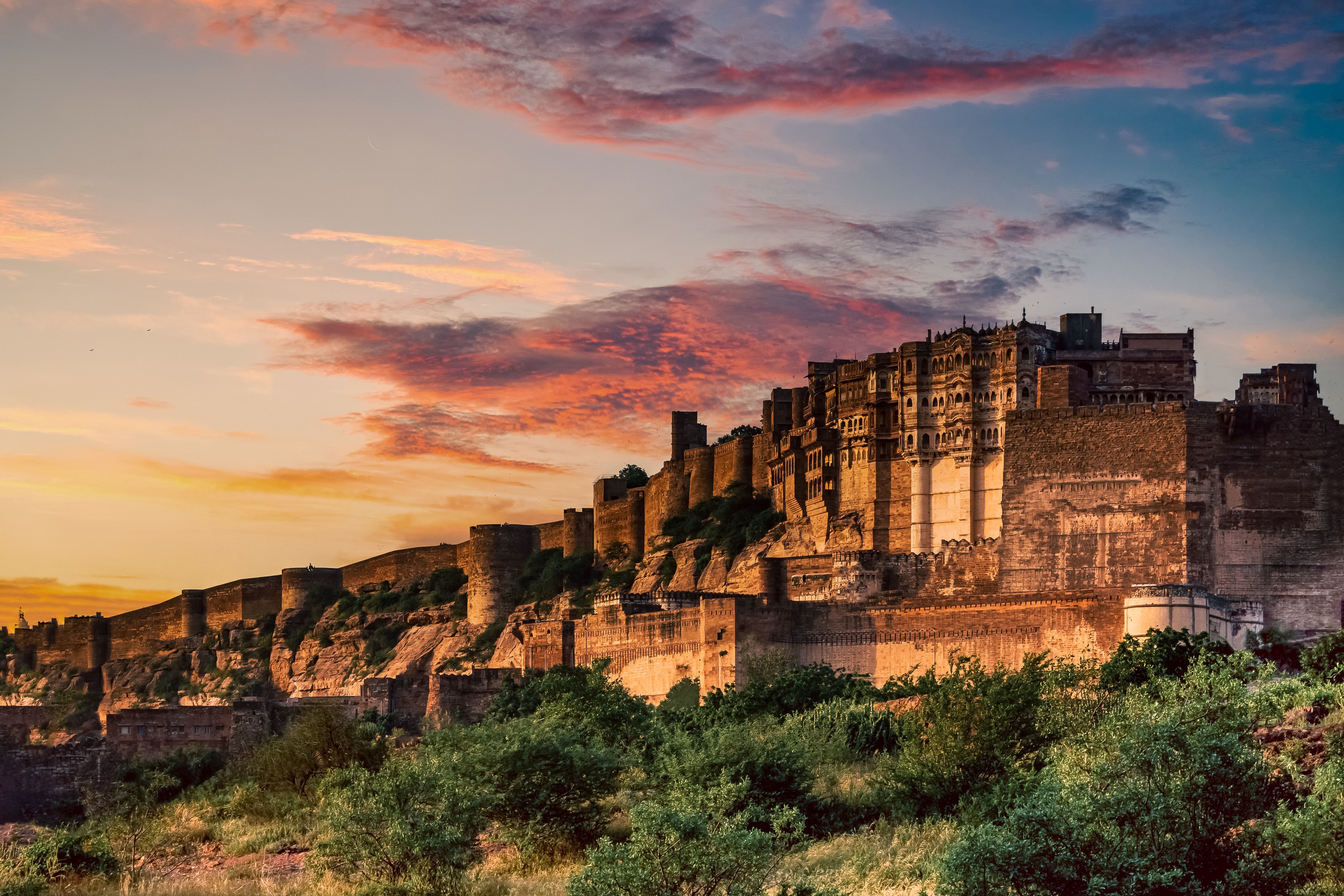 stunning view of mehrangarh fort during a vibrant sunset in jodhpur