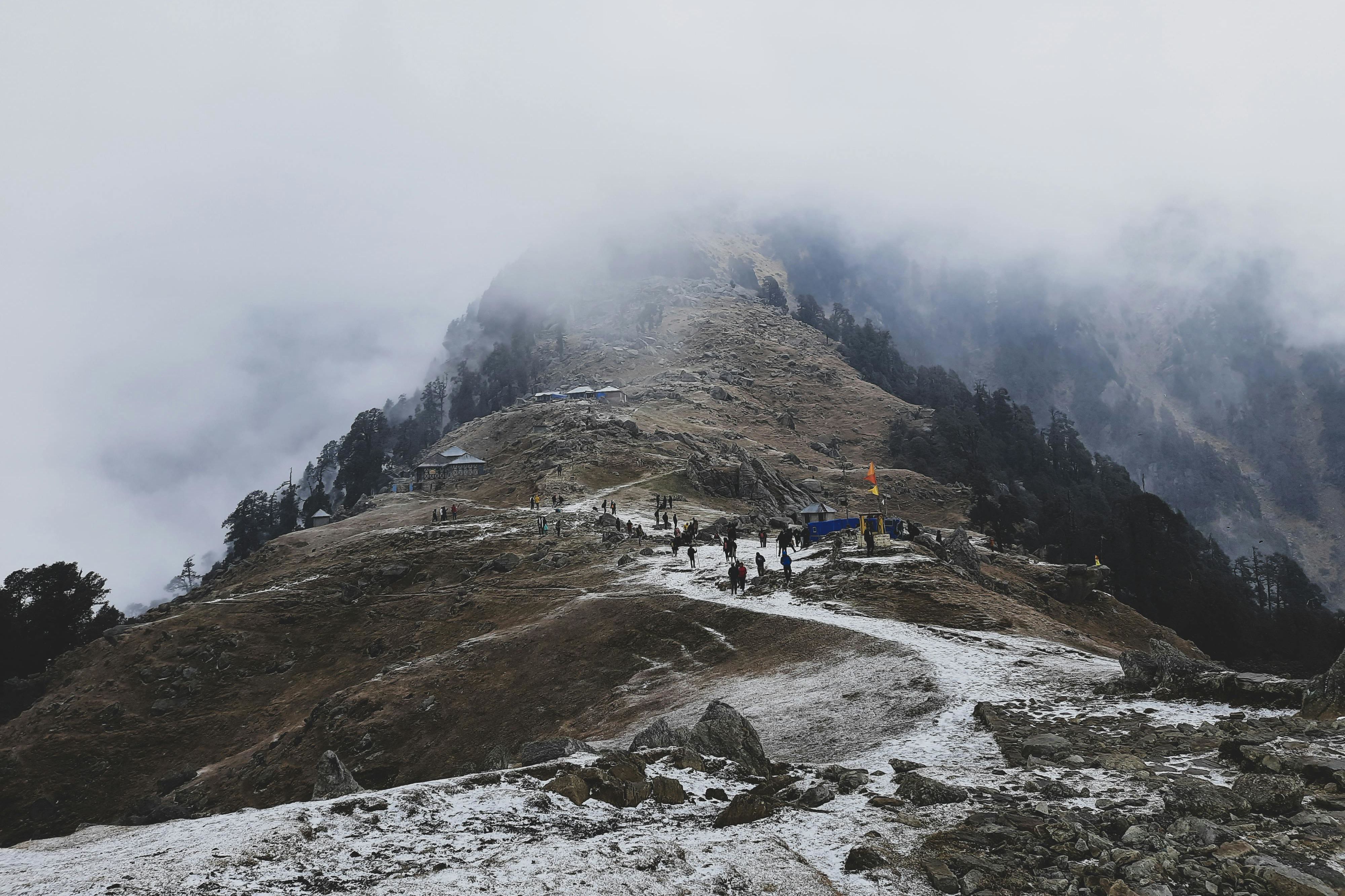 people going on snowy triund trek trail near dharamshala