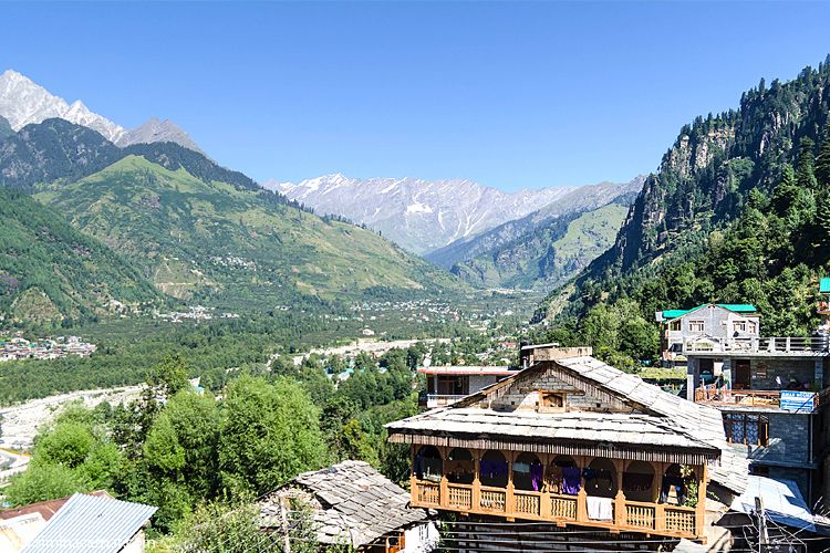 view of vashisth village with green mountains in the backdrop
