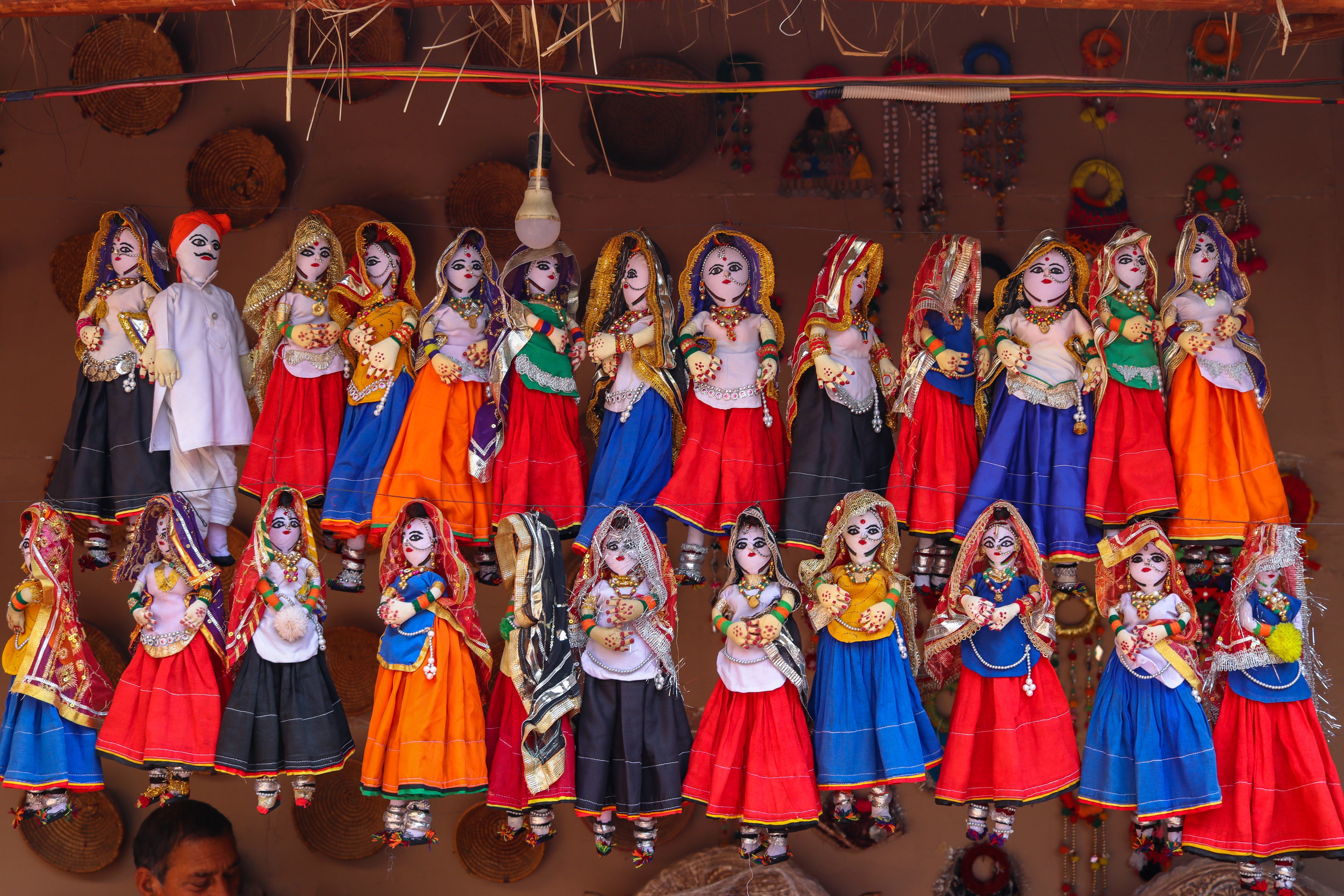 handcrafted puppets on display in barmer