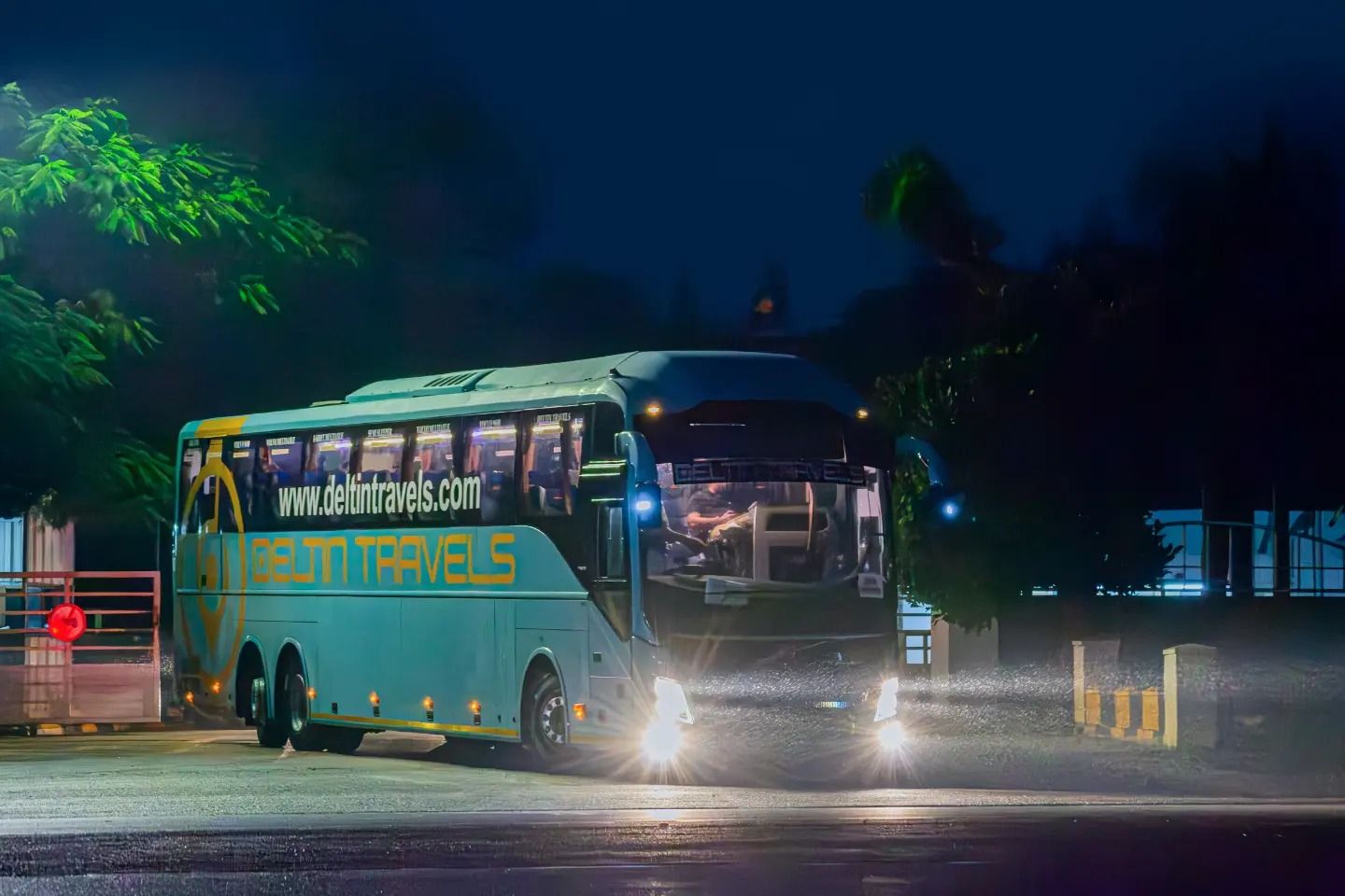 a volvo bus on road travelling between delhi and manali