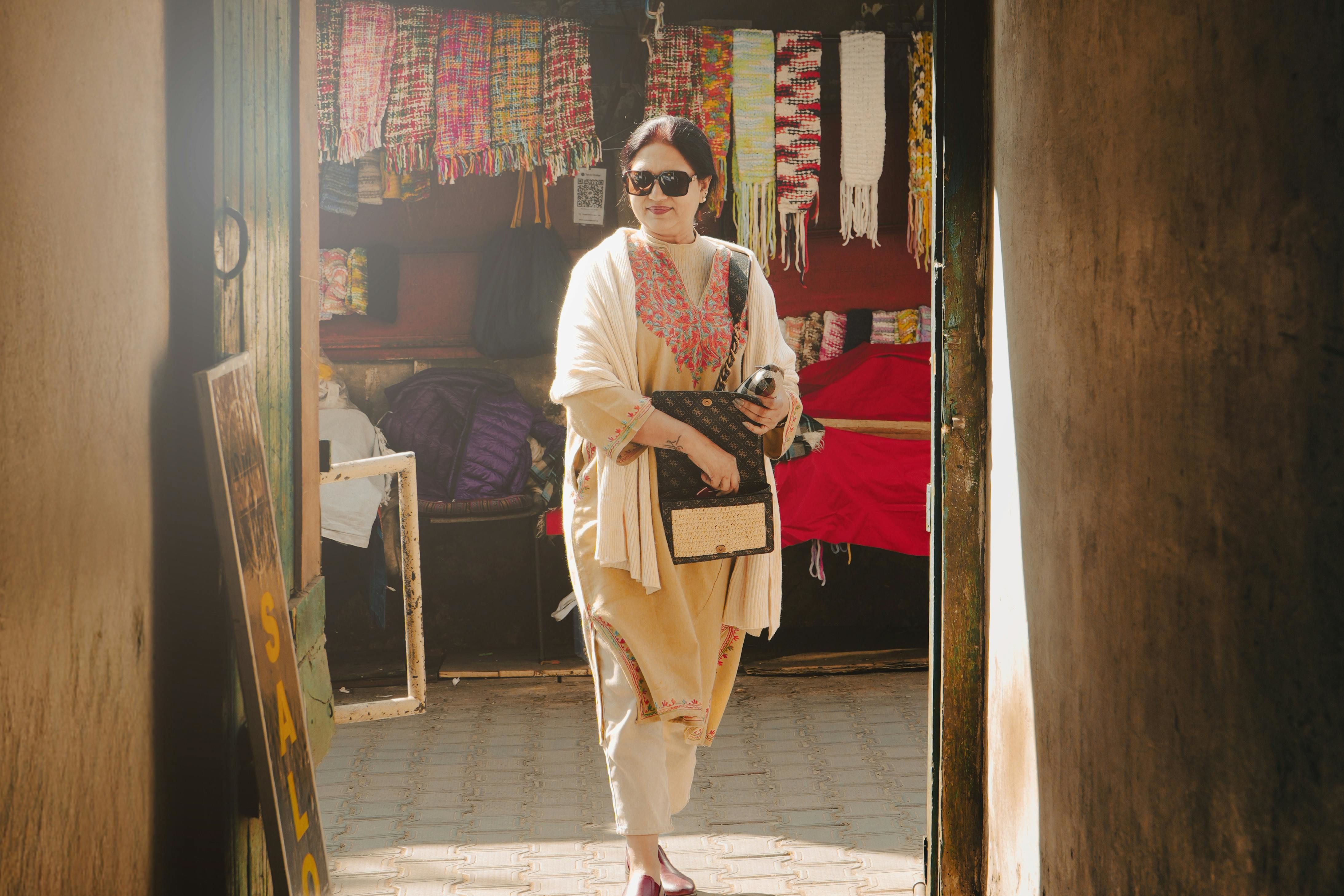 a woman shopping at dharamshala market